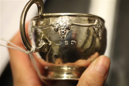 A George V Arts & Crafts silver cream jug and sugar bowl by Albert Edward Jones, 7.5 oz.